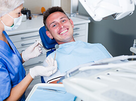 Man attending checkup to care for his dental implants